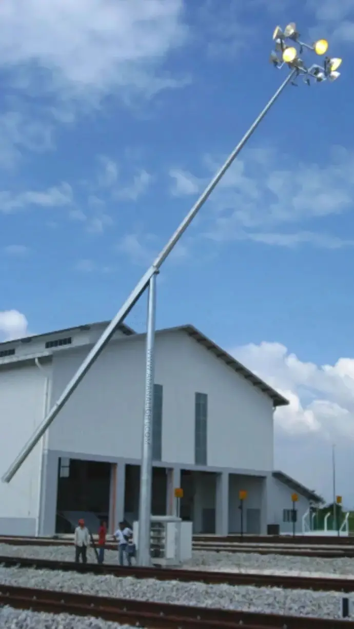 Mid-Hinged Street Lighting Pole for Easy Maintenance – Heavy Duty Galvanized Steel Pole with Manual Lowering System for Roadways, Highways, Public Areas, and Industrial Sites.